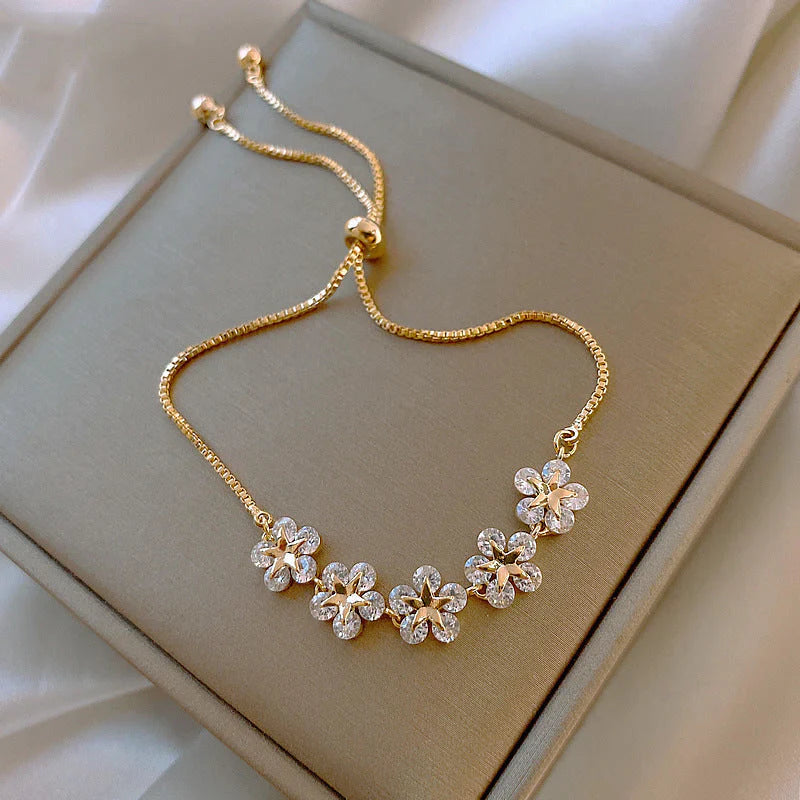 Goldenes Gänseblümchen-Armband