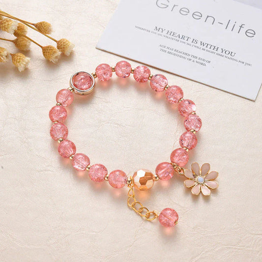 Armband mit rosa Steinen und Gänseblümchen