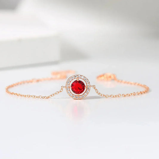 Klassisches rosa Armband mit roten Steinen und Kristallen